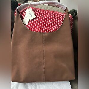 Brown 100% genuine Leather hobo Bag. Comes with extra crossbody/pouch.